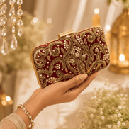 Wine red satin clutch with gold ornate beadwork and kiss-lock clasp