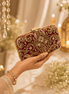 Wine red satin clutch with gold ornate beadwork and kiss-lock clasp