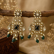Pair of chandbali chandelier earrings, gold-tone, black kundan centers, green dangling drops.