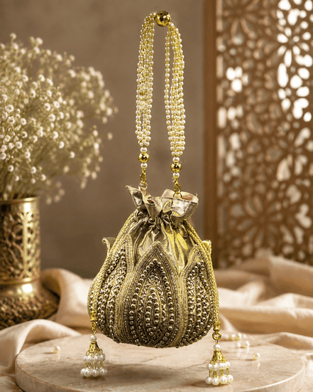 Gold beaded potli bag with pearl handles, ruffled satin pouch, long tassels
