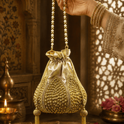 Gold drawstring potli bag with pearl bead handles and dangling pearl tassels