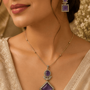 Gold pendant necklace set with purple square earrings and diamond drop pendant on model