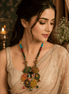 Hand-painted circular pendant statement necklace with multicolor beads and centered charm cluster