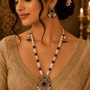 Beaded mala set with pearl beads, gold maroon pendant, matching drop earrings
