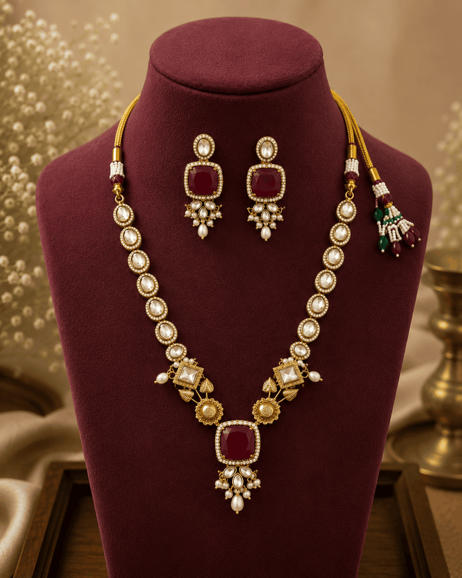 Gold-toned necklace set with maroon square center pendant and round drop earrings