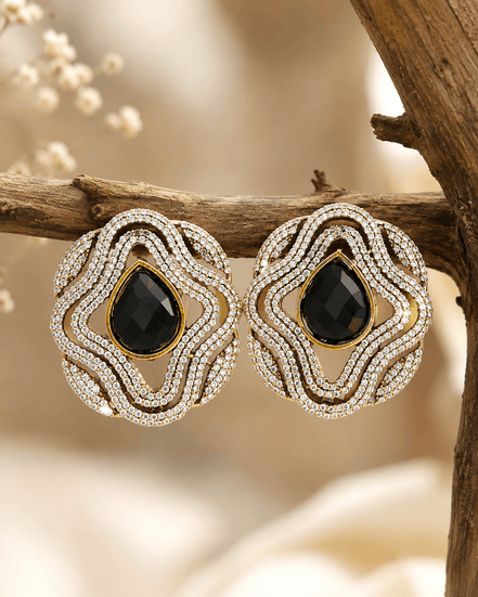 Brass-tone statement stud earrings with black teardrop center in double crystal rows
