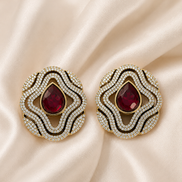 Brass-tone statement stud earrings with red teardrop center and layered crystal trim