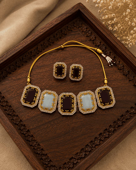 Statement choker set with gold-tone cord, square enamel links, and matching stud earrings