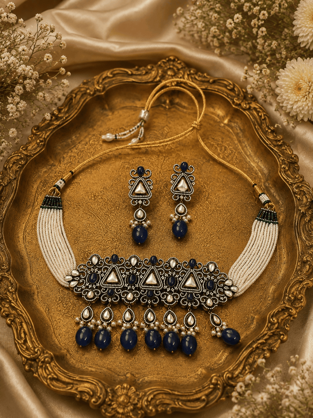 Zara Heritage choker set laid on tray, royal blue beads with matching drop earrings