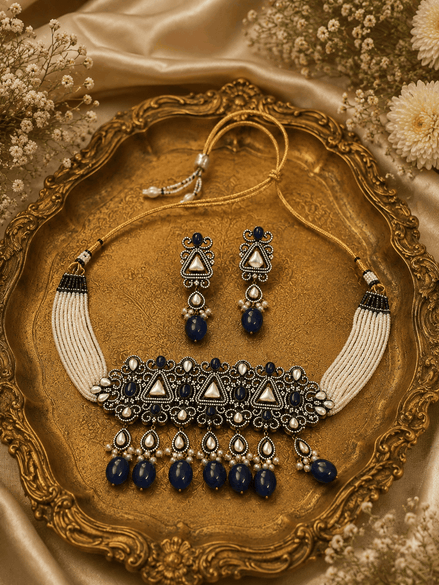 Zara Heritage choker set laid on tray, royal blue beads with matching drop earrings