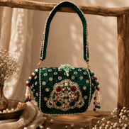 Emerald green beaded box clutch with jeweled medallion front and pearl-like bead accents