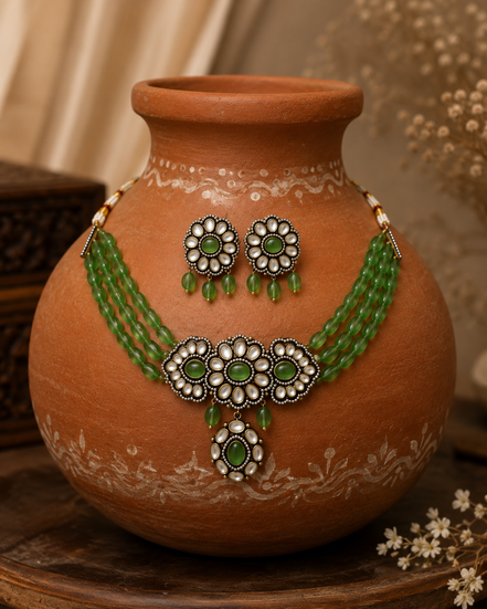 Green floral choker set with layered bead necklace and matching dangling earrings