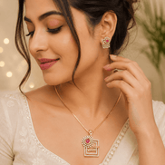 Ruby red pendant necklace with matching earrings on model, geometric square design
