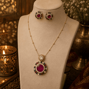 Gold-tone pendant necklace set with round multicolor gemstone earrings and teardrop pendant