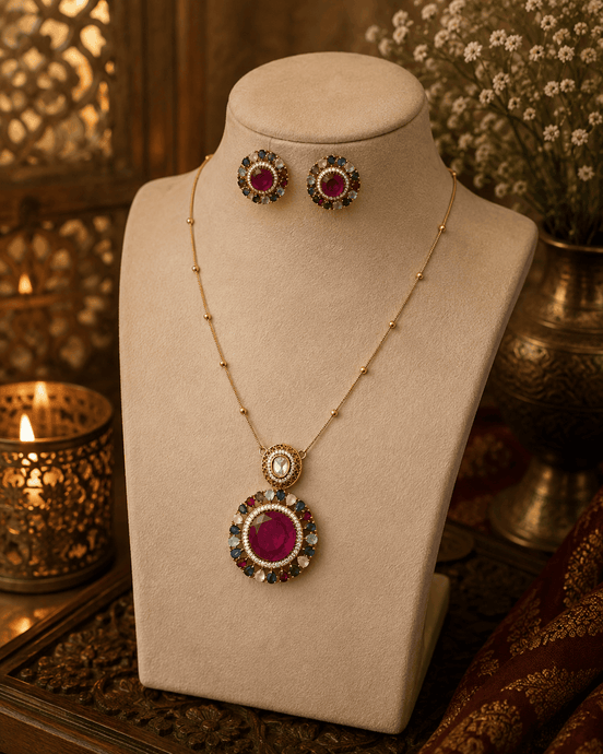 Gold-tone pendant necklace set with round multicolor gemstone earrings and teardrop pendant