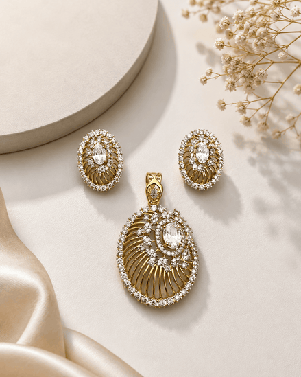 Gold-tone pendant with clear oval halo and matching stud earrings