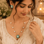 Gold-tone necklace with turquoise center pendant and matching stud earrings, small round links