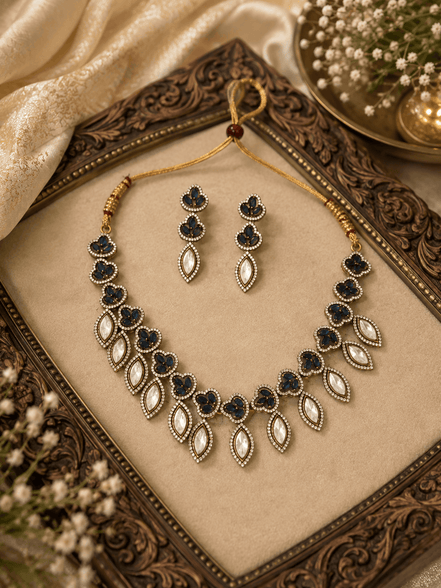 Teal and gold necklace set with teardrop stones and matching drop earrings