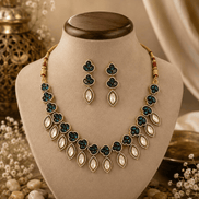 Navy blue and gold beaded necklace with matching drop earrings