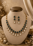 Navy blue and gold beaded necklace with matching drop earrings