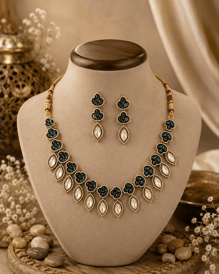 Navy blue and gold beaded necklace with matching drop earrings
