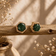 Dark-green gemstone stud earrings with ornate gold-tone octagonal setting