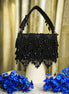 Black crystal hobo bag with top handles and beaded fringe bottom