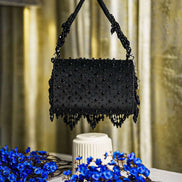 Black crystal beaded hobo bag with top handles and fringe trim