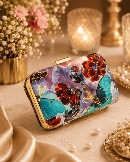 Floral clutch bag with multicolor print and gold-tone chain strap and clasp