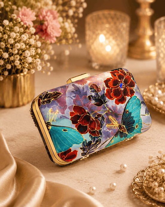 Floral clutch bag with multicolor print and gold-tone chain strap and clasp