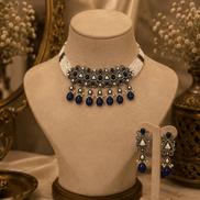 Zara Heritage choker set on mannequin, royal blue bead drops and triangular filigree