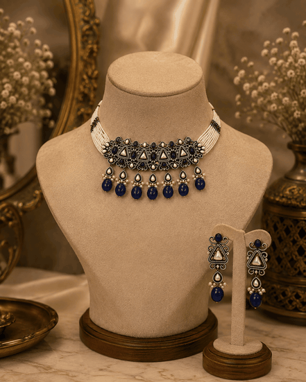 Zara Heritage choker set on mannequin, royal blue bead drops and triangular filigree