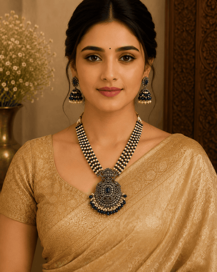Navy blue beaded pearl necklace set with ornate pendant and dangling earrings