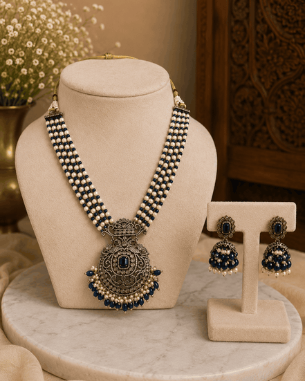 Navy blue beaded pearl necklace set with large round pendant and stud earrings