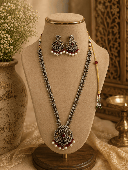 Wine statement necklace set with silver-tone chains, maroon heart pendant, pearl drop earrings