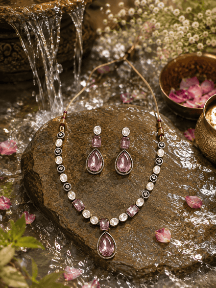 Necklace set with pink teardrop pendant and matching earrings