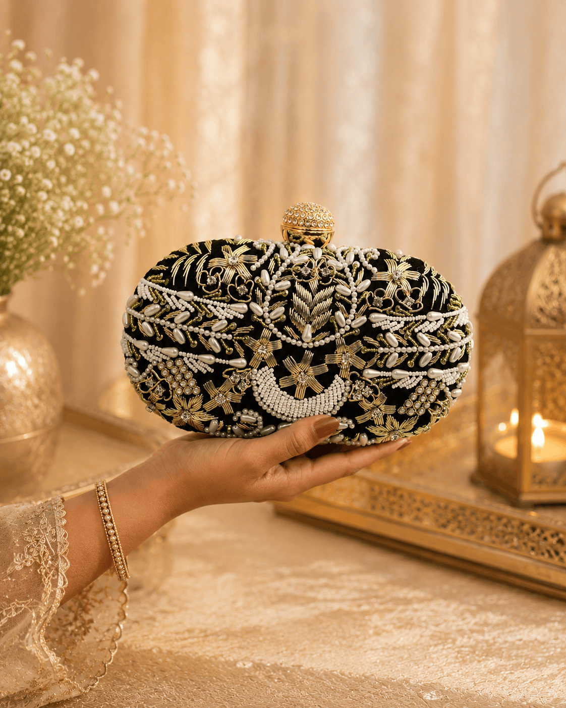 Black and gold beaded clutch with rounded top clasp
