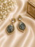 Gold-tone drop earrings with square stud and teardrop dark green stones