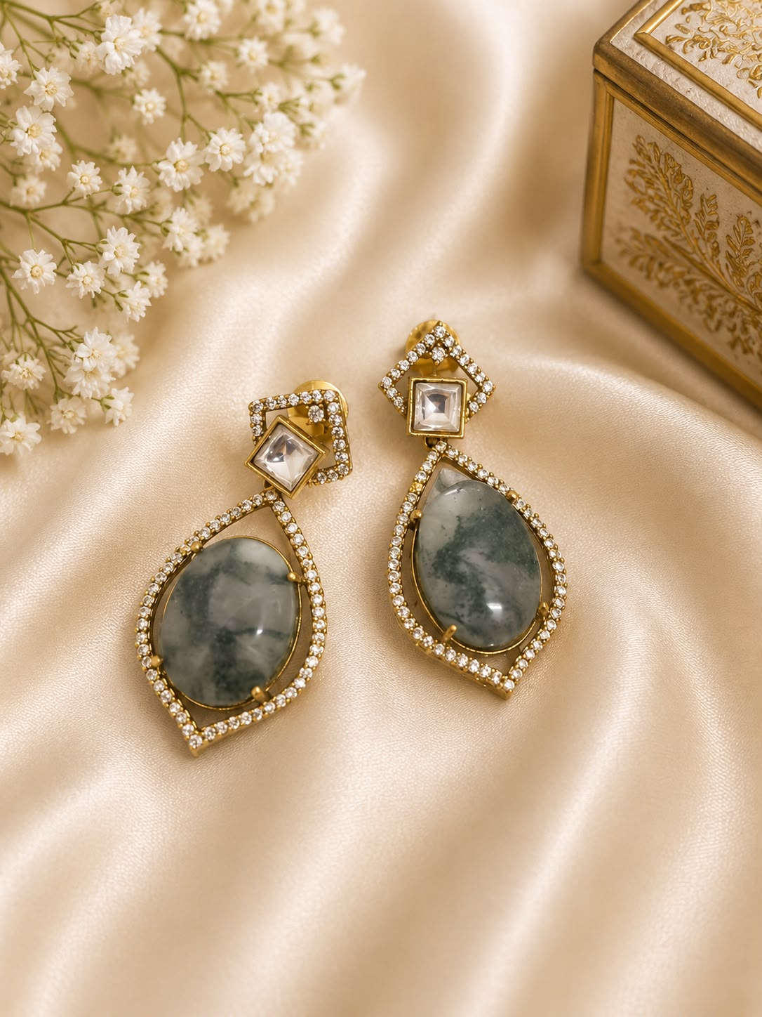Gold-tone drop earrings with square stud and teardrop dark green stones