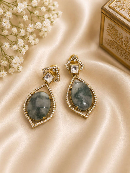 Gold-tone drop earrings with square stud and teardrop dark green stones