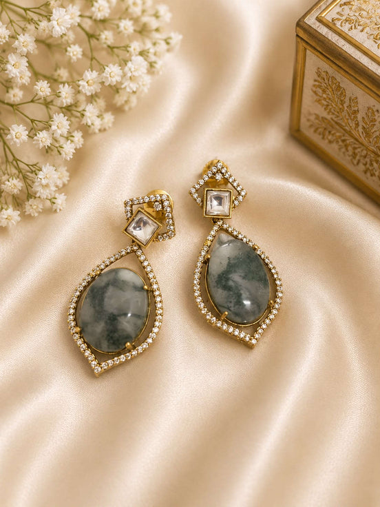 Gold-tone drop earrings with square stud and teardrop dark green stones