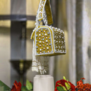 Mustard-trim pearl crystal fringe handbag with short chain handle and dangling beads