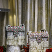 Black beaded pearl crystal fringe handbag with rhinestone-studded top and drops