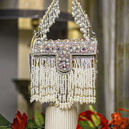 Mustard-trim pearl crystal fringe handbag with jeweled top clasp and long bead drops