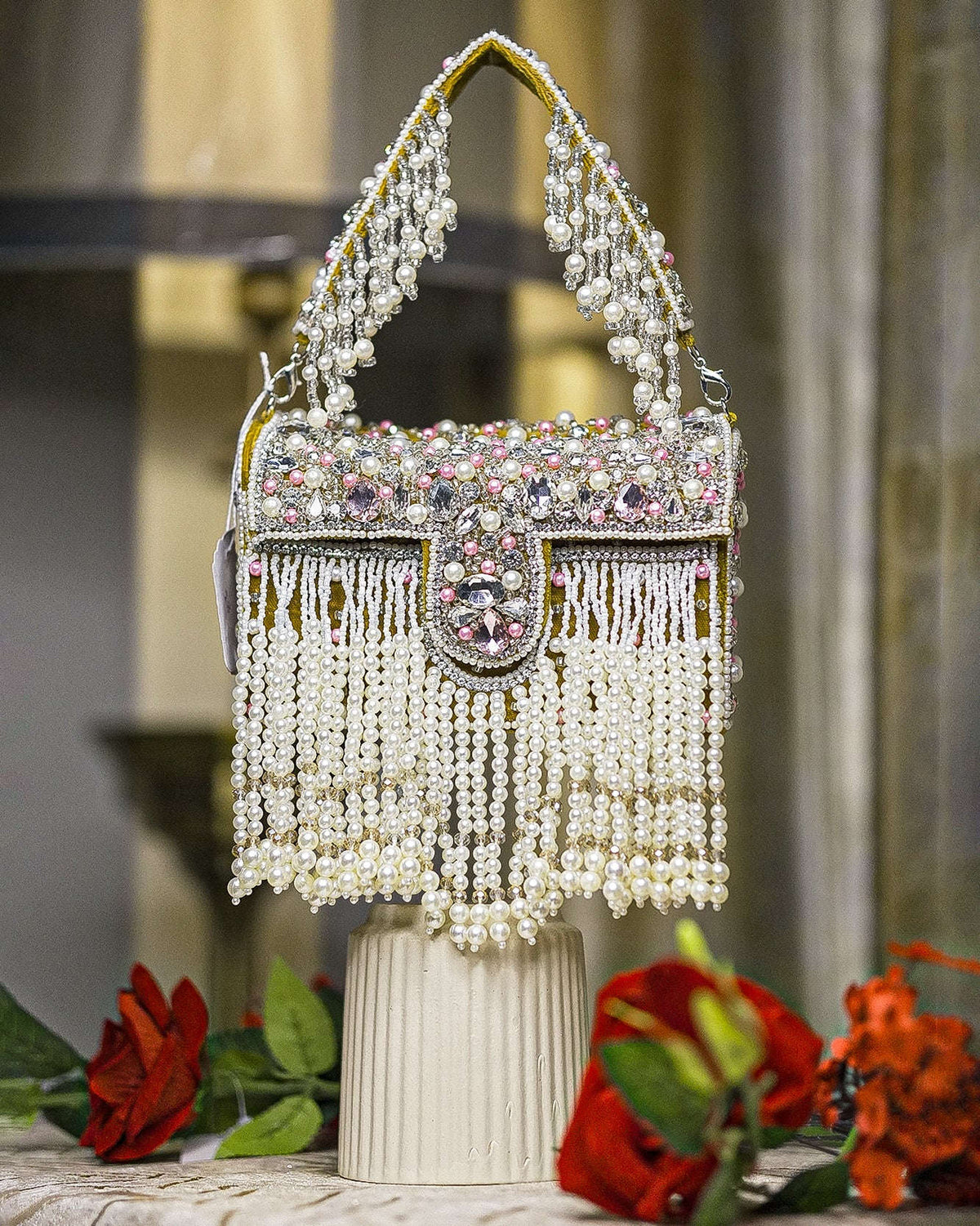 Mustard-trim pearl crystal fringe handbag with jeweled top clasp and long bead drops