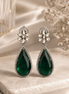 Floral teardrop statement earrings with crystal flower tops and dark green gemstone drops