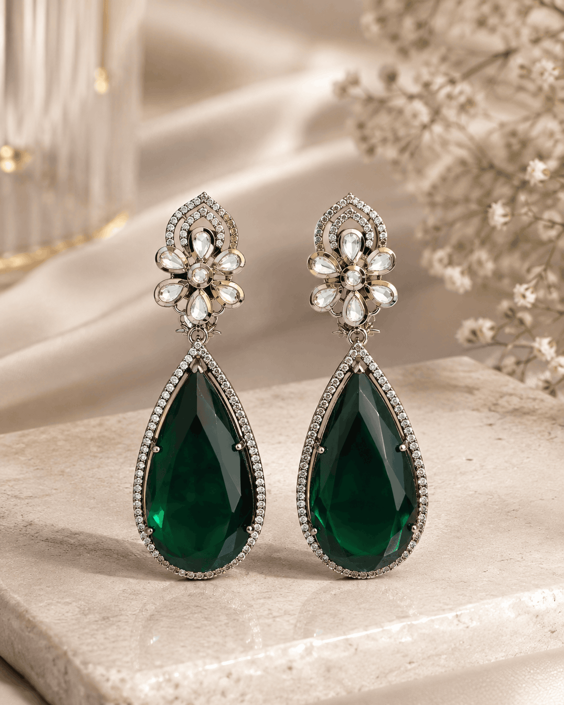 Floral teardrop statement earrings with crystal flower tops and dark green gemstone drops