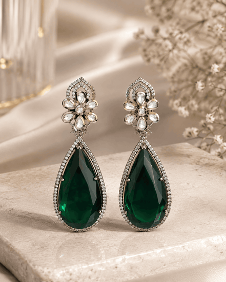 Floral teardrop statement earrings with crystal flower tops and dark green gemstone drops