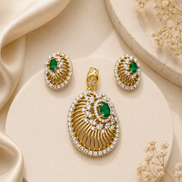 Gold-tone pendant with green oval halo and matching stud earrings
