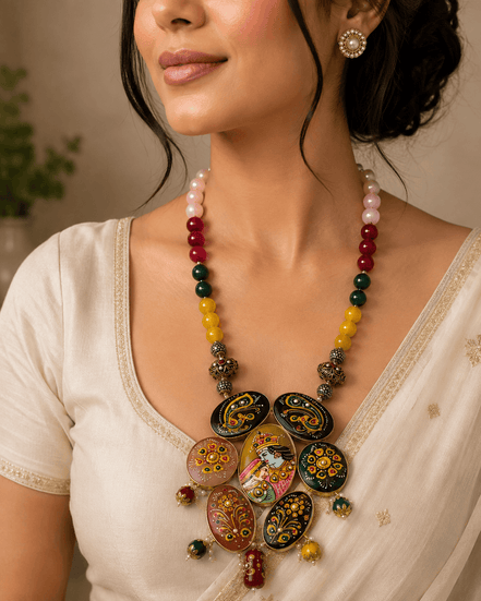 Multicolor beaded statement necklace with round hand-painted pendants and dangling charms
